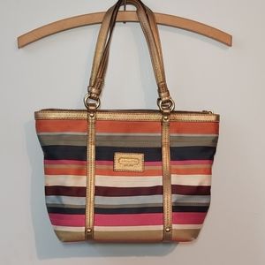 Gold leather trim coach purse